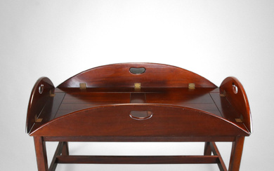 A BUTLER TABLE, lacquered wood, brass details, possibly yew, second half of the 20th century.