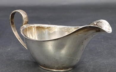 A Birmingham silver sauce boat with scroll handle, 3.6 oz