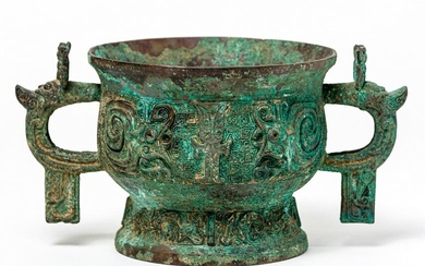 A CHINESE BRONZE GUI VESSEL, probably 17th c. or