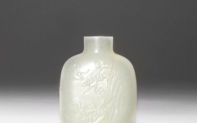 A CHINESE PALE CELADON JADE SNUFF BOTTLE 18TH CENTURY One...