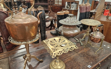 A COPPER EPERGNE, THREE BRASS TRIVETS, A COPPER KETTLE AND ANOTHER ON A BRASS STAND