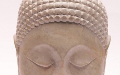 A Carved Marble Buddha Head (small chip to base) (H: 29cm)