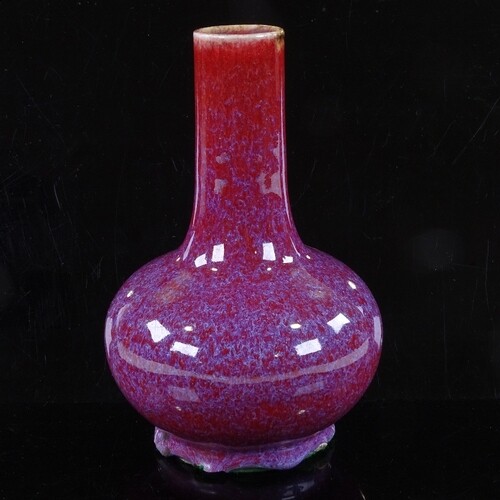 A Chinese Jun Ware narrow-neck porcelain vase with red glaze...