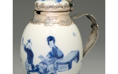 A Chinese blue and white vase, 18th c, painted with a seated...