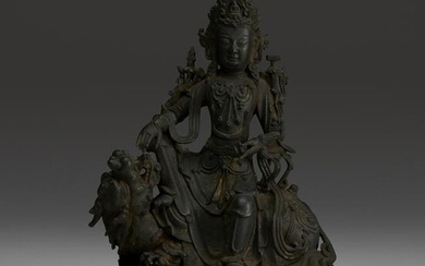 A Chinese bronze figure of the bodhisattva Wenshu