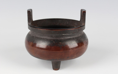A Chinese brown patinated bronze tripod censer, mark of Qianlong but later, of low-bellied circular