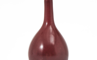A Chinese porcelain miniature vase, 18th/20th century, oxblood glaze (sang de boeuf), with four character mark.
