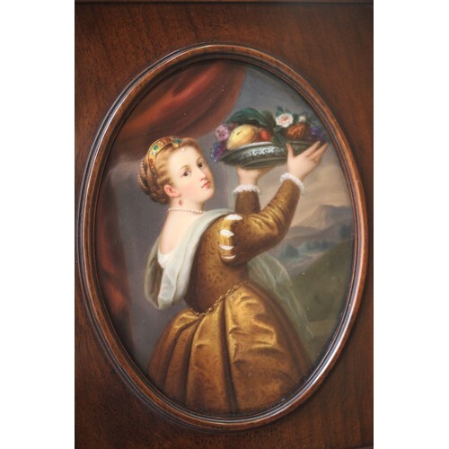 A Continental oval porcelain plaque, painted with a portrait...