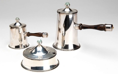 A Dutch silver coffee pot, milk jug and sugar bowl with cover and moon stone finials