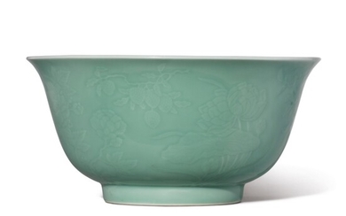 A FINE LARGE MOLDED CELADON-GLAZED BOWL, QIANLONG SEAL MARK AND PERIOD
