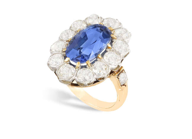 A FINE SAPPHIRE AND DIAMOND CLUSTER RING, FIRST...
