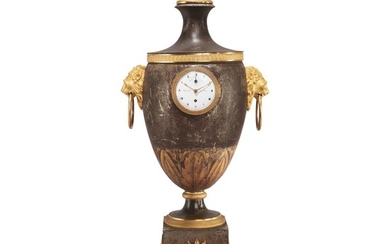 A FRENCH EMPIRE GILT BRONZE-MOUNTED TOLE PEINTE URN-FORM NIGHT PROJECTION TIMEPIECE, CIRCA 1810