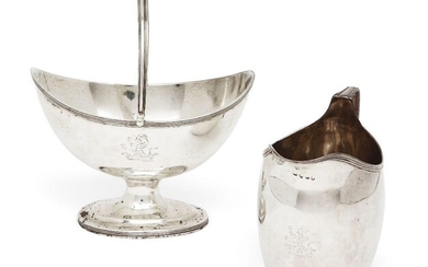 A George III silver bonbon dish, London, 1797, Robert Hennell I & David Hennell II, together with a cream jug by the same maker, London, 1800, both engraved with lion crest and designed with reeded rims and handles, the bonbon dish 11.5cm high, the...