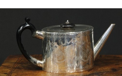 A George III silver oval drum shaped teapot, bright-cut engr...