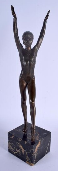 A LARGE 1950S BRONZE FIGURE OF A BALLERINA modelled
