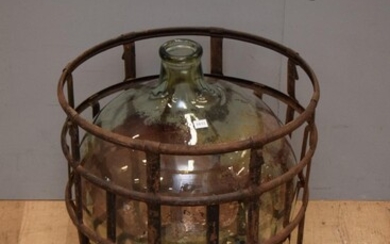 A LARGE 19TH CENTURY FRENCH DEMIJOHN IN ORIGINAL METAL PROTECTIVE CAGE (58H X 53W CM)