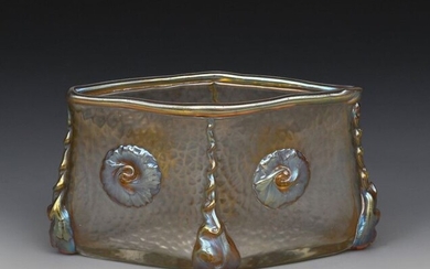 A Loetz glass vase, tapering diamond section, applied prunts and trails, covered with a golden iridescence, 15.5cm. wide, 8.5cm. high