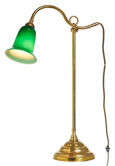 A MODERN ADJUSTABLE BRASS DESK LAMP WITH GREEN GLASS SHADE