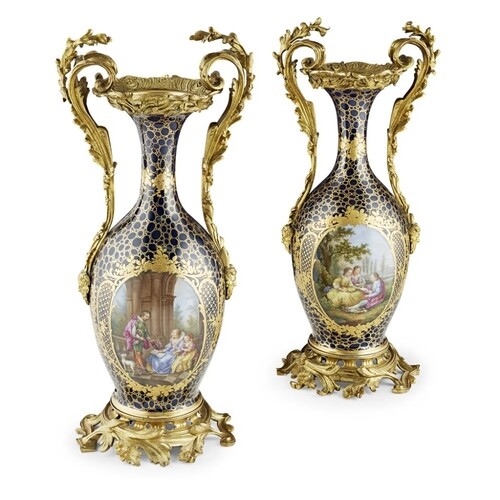 A PAIR OF 19TH CENTURY FRENCH PORCELAIN AND BRONZE ORMOLU VA...