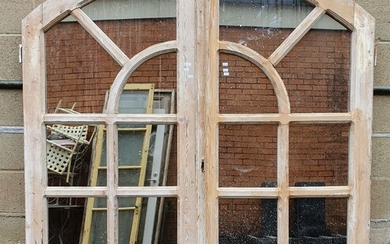 A PAIR OF DOME-TOP MIRRORED FRENCH WINDOWS