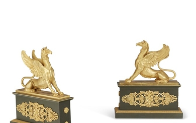 A PAIR OF FRENCH ORMOLU AND PATINATED-BRONZE CHENETS