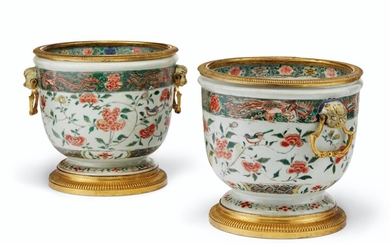 A PAIR OF FRENCH ORMOLU-MOUNTED CHINESE FAMILLE VERTE PORCELAIN CACHE POTS, THE MOUNTS 19TH CENTURY, THE PORCELAIN KANGXI (1662-1722)