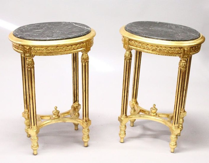 A PAIR OF FRENCH STYLE OVAL GILTWOOD OCCASIONAL TABLES