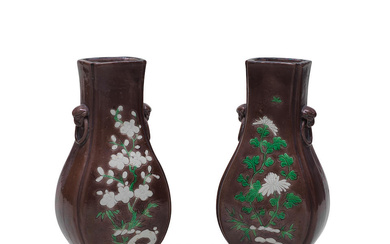 A PAIR OF GREEN, WHITE AND AUBERGINE GLAZED FLORAL VASES...