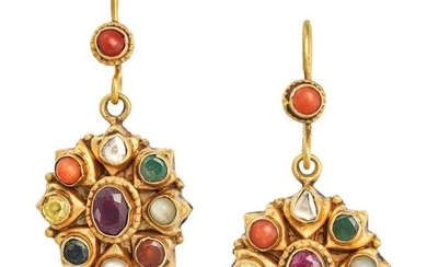 A PAIR OF INDIAN GEMSET EARRINGS in yellow gold, each comprising a coral bead suspending an oval cut