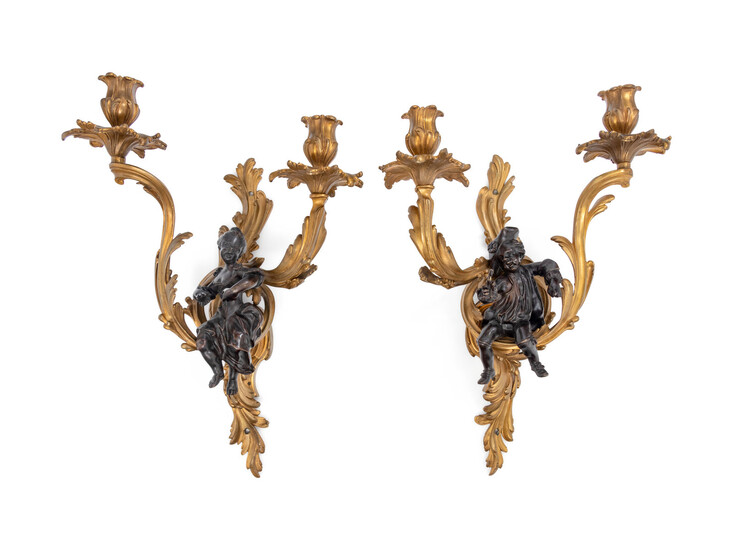 A Pair of Louis XV Style Gilt and Patinated Bronze Figural Two-Light Sconces