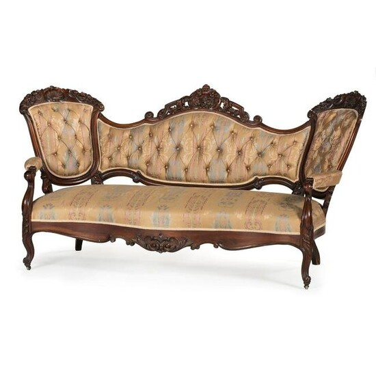 A Pair of Renaissance Revival Carved Walnut Settees