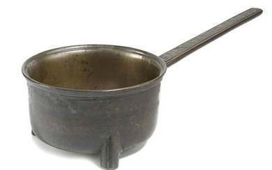 A QUEEN ANNE BRONZE SKILLET BY CLEMENT TOZIER...