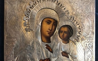 A Russian Icon of The Iverskaya Mother of God with Silver Oklad and Travel Kiot.