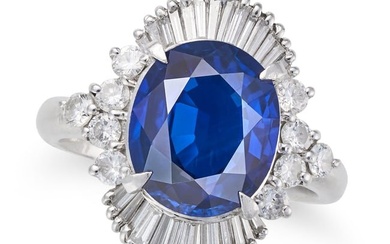 A SAPPHIRE AND DIAMOND DRESS RING set with an oval cut sapphire of approximately 4.00 carats, in ...