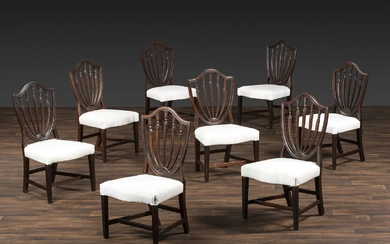 A Set of Eight Federal Carved Mahogany Shield-Back Dining Chairs