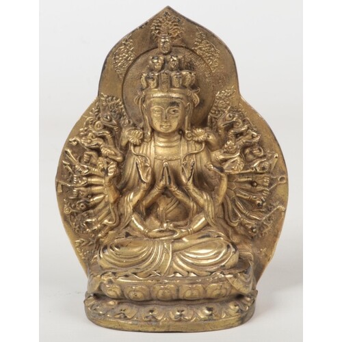 A Sino Tibetan gilt metal small devotional statue of a Buddh...