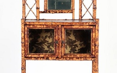 A TWO DOOR BAMBOO CABINET CIRCA 1890