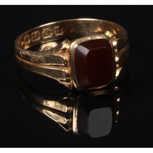 A Victorian 18 carat gold carnelian signet ring. Set with a ...