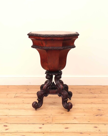 A Victorian flame mahogany teapoy by Gillows of Lancaster
