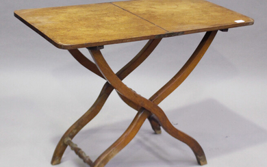 A Victorian mahogany coaching table, raised on a folding 'X' frame base, height 67cm, widt