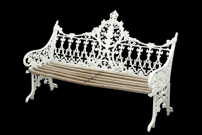 A WHITE PAINTED METAL GARDEN BENCH, IN THE VICTORIAN