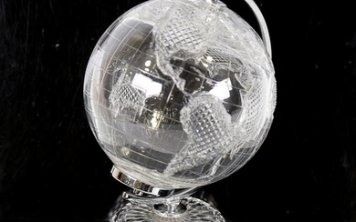 A Waterford Crystal desk-top globe, with chrome plate mounts...