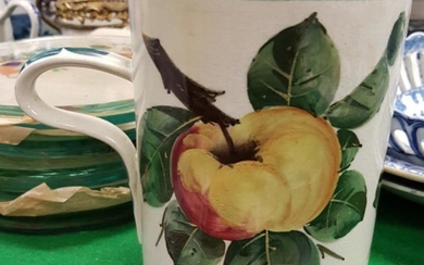 A Wemyss Pottery "Apple" decorated mug, bears impressed "Wemyss"...