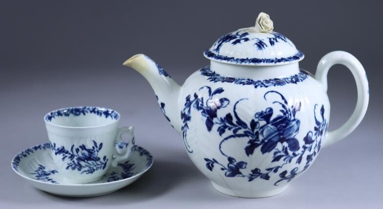 A Worcester Blue and White Porcelain Moulded Cup and...