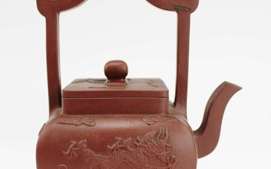 A Yixing teapot with arch handle