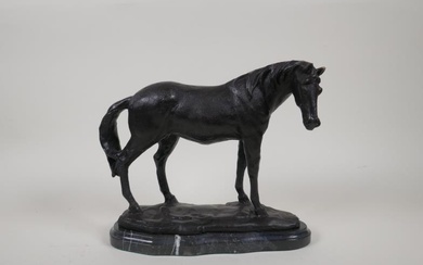A bronze figure of a horse, on a marble...