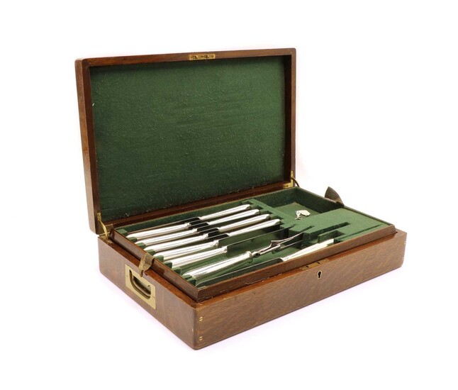 A cased set of stainless steel knives by Mackay & Chisholm
