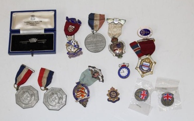 A collection of enamelled Masonic stewards medals, a Navy sweetheart...