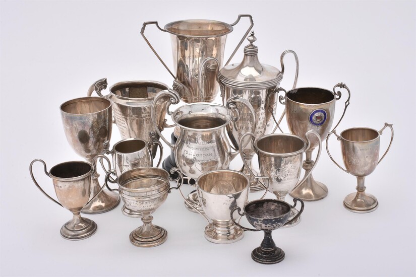 A collection of silver trophy cups