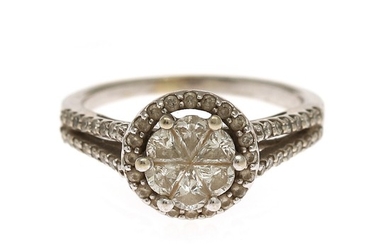 A diamond ring set with numerous fancy- and brilliant-cut diamonds, mounted in 14k white gold. Size 48.5.